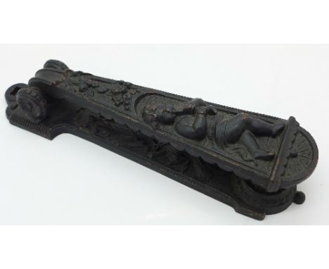 A Kenrick &amp; Sons cast iron door knocker