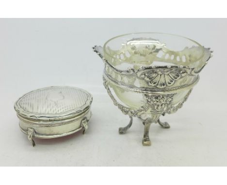 A silver oval trinket box and a silver stand with glass bowl insert, box 7.5cm, silver stand with import hallmark