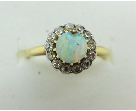 An 18ct gold, opal and white stone ring, 2.5g, O, opal a/f