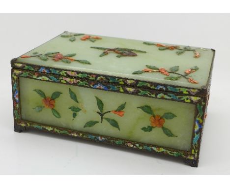 A Chinese jade box with enamel decorated metal mounts and also decorated with coral and jade flowers and a bird, a/f, 15.5cm