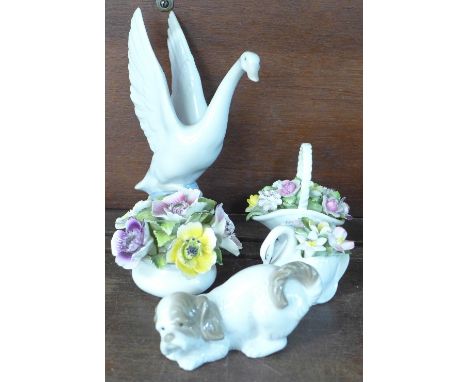 Two Nao figures and three posy baskets including Royal Doulton