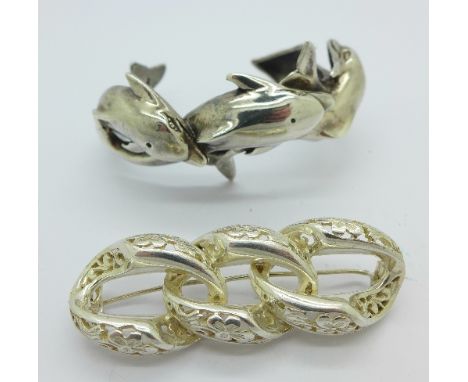 A 925 silver dolphin bangle and an 800 silver brooch