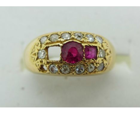 An 18ct gold ruby and diamond ring, one stone missing, 2.1g, K