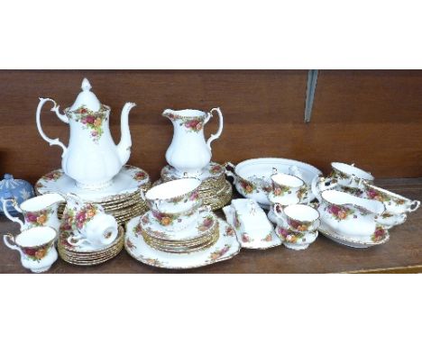 Royal Albert Old Country Roses dinnerware and coffee service, nine dinner plates, six soup bowls and saucers, six coffee cups