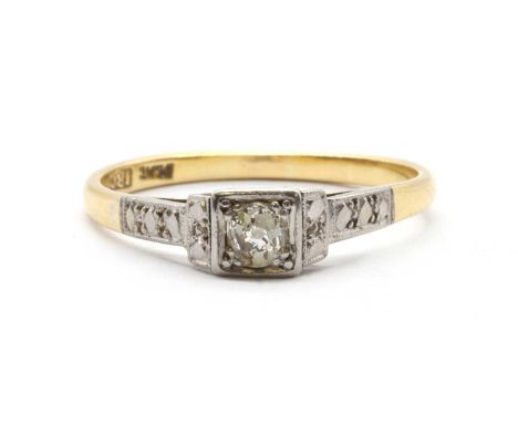 A gold single stone diamond ring,an old cut diamond, grain set to a box collet, to tapering shoulders and a plain shank, test