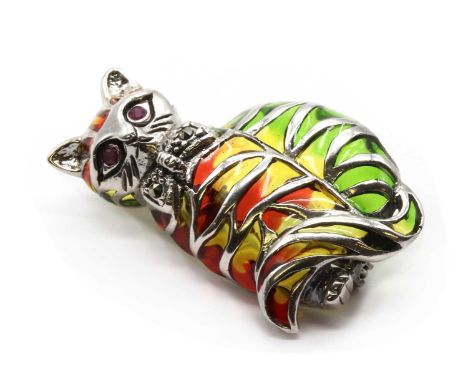 A silver plique-à-jour enamel and ruby cat brooch/pendant, with green, yellow and red plique-à-jour enamel to the body, to ru