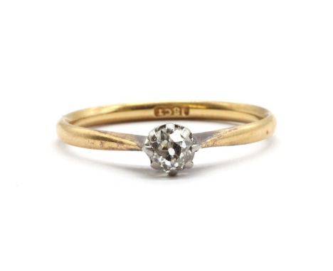 A gold single stone diamond ring, an old cut diamond, claw set to solid tapered shoulders and a plain shank, tested as approx