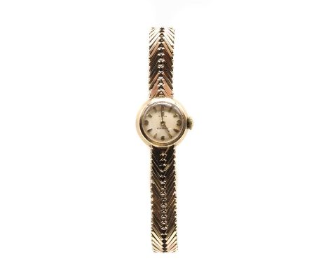 A ladies' 9ct gold Cyma 'Cymaflex' mechanical bracelet watch,17.5mm diameter with a silvered dial, baton hour markers and Ara