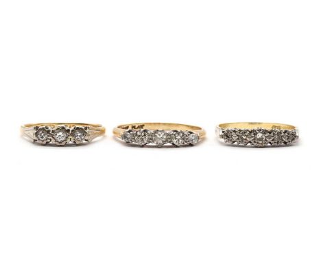 Three gold rings, comprising a five stone graduated diamond ring, tested as approximately 18ct gold, and 18ct gold five stone