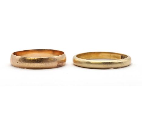 Two gold wedding rings, comprising a light 'D' section wedding ring, tested as approximately 18ct gold, 2.16g, and a 'D' sect