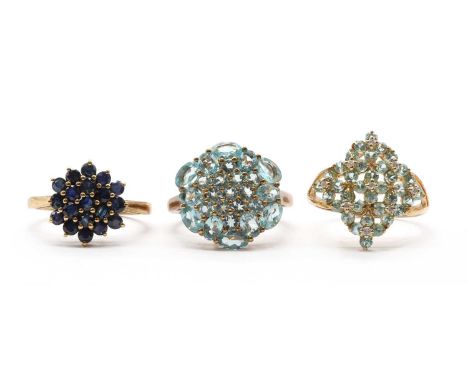 Three 9ct gold rings, to include an apatite cluster ring, an apatite and diamond cluster ring, and a sapphire cluster ring, B