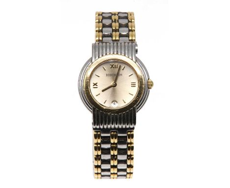 A ladies' bi-colour Boucheron 'Solis' quartz bracelet watch,26.50mm, with a circular champagne dial with raised Roman numeral