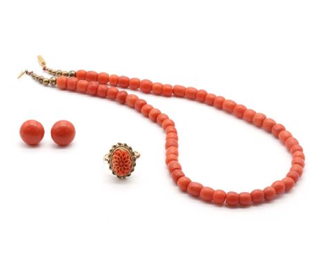 A collection of coral jewellery, comprising a single row coral bead necklace, the beads approximately 6.50 to 7.00mm wide, to