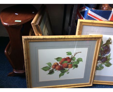 Eight framed and glazed prints depicting fruit and flowers with a magazine table, a VDO Quartz brass framed wall clock and a 