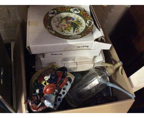 Two boxes of mixed items to include ceramic ornament, various tea and dinnerware, glass pipe, Schweppes soda syphon plates et