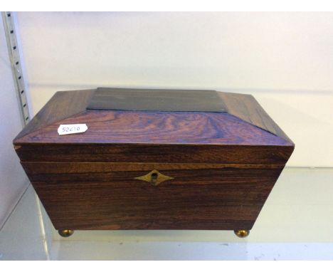 A Georgian Rosewood sarcophagus tea caddy.
