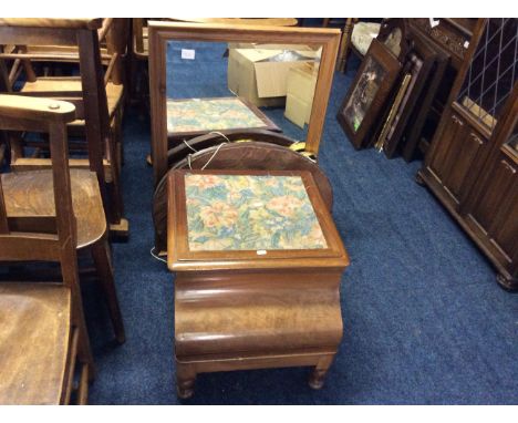 A selection of mirrors and prints with a commode.
