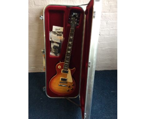 *A Gibson Les Paul standard heritage sunburst - 2016 high performance with robot tuners in aluminium travel case.