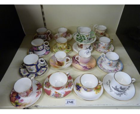 A large quantity of Royal Worcester decorative cups and saucers reviving old patterns 