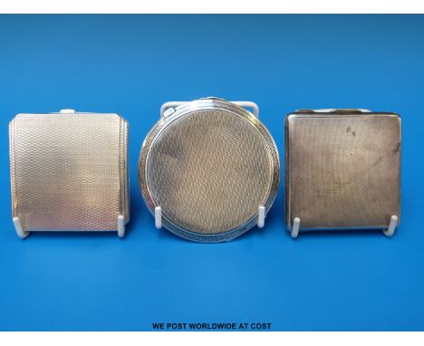 Two engine turned hallmarked silver compacts (148g) together with an Art Deco style circular hallmarked silver compact (87g a