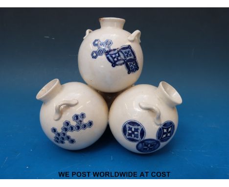 A Royal Worcester posy vase formed as a stack of four twin-handled pots in the Japanese style c1878