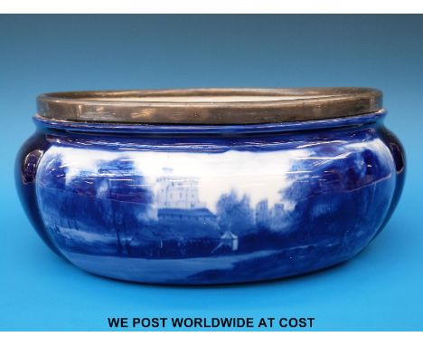 An oval Royal Doulton flow blue dish circa 1900 with castle scene to one panel (28 x 24cm)