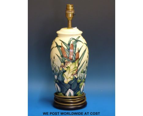 A Moorcroft table lamp in the Lamia pattern (38cm tall)