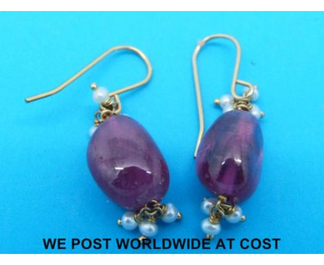 A pair of ruby and seed pearl earrings 