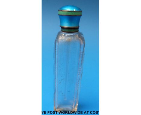 A cut glass scent bottle of tapering form with blue and green guilloché enamel mount and screw top, 5cm tall
