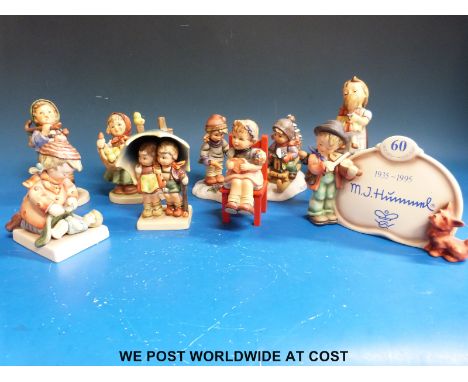 Nine Hummel figures and figure groups one in the form of a display plaque, all in original boxes.  
