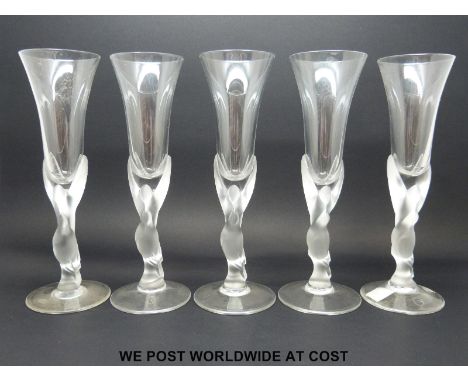 Five Carl Fabergé 'Kissing Doves' glasses, the body of fluted form supported by stems in the form of two frosted kissing dove