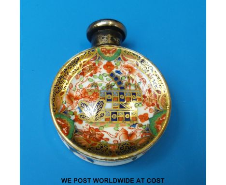 A 19thC circular porcelain scent bottle with hallmarked screw top, Imari decoration and registration no 29260, possibly Royal