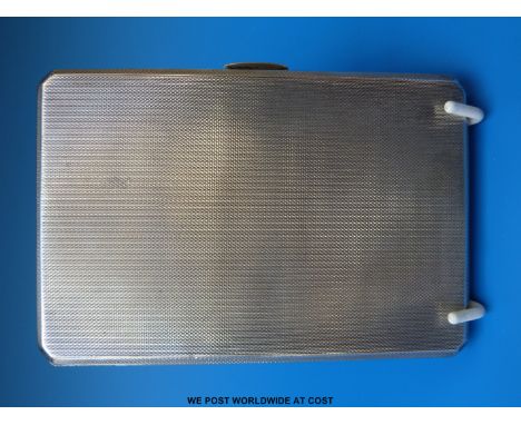 A hallmarked silver cigarette case with all over engine turned decoration, Birmingham 1946, maker WMN (182g)