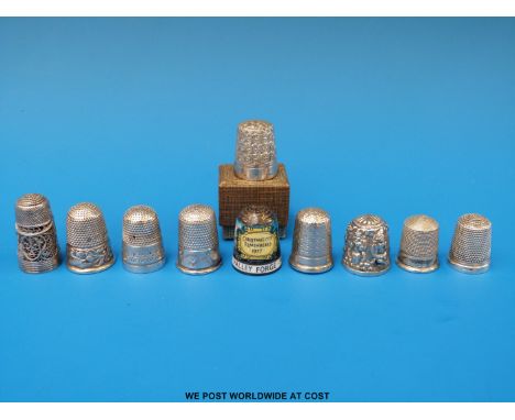 Seven various hallmarked silver and white metal thimbles including two Charles Horner and an enamel example together with two