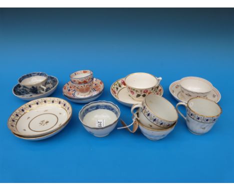 A quantity of first period/ 18thC porcelain including Worcester, Newhall, armorial tea bowl, Derby cup and saucer etc 