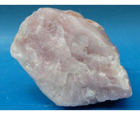 A very large selenite wand (length 50cm) together with a rose quartz boulder