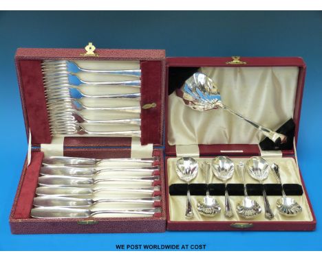 A cased Art Deco fish knife and fork set and cased seven piece fruit set