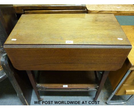 A small mahogany Pembroke trolley with shelf under 