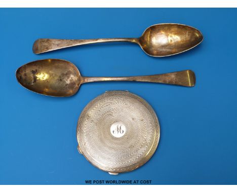 Two Georgian hallmarked silver tablespoons (115g) together with a silver plated engine turned compact