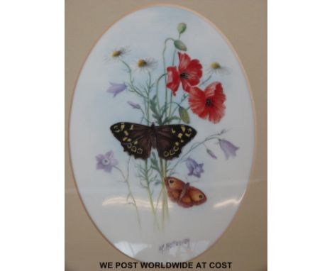 A framed ceramic plaque decorated with hand painted flowers and butterflies and signed Mr Holloway (ex Royal Worcester)