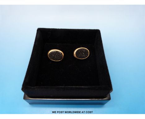 A pair of 18ct gold cufflinks set with black onyx by Annoushka in original box  