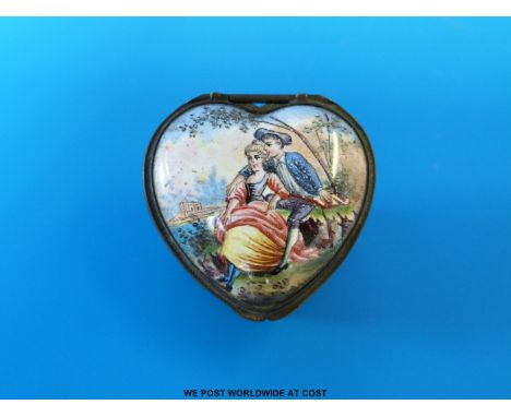 An exceptional George III heart shaped lidded enamel patch box with a central scene of sweethearts in a garden and unusually 