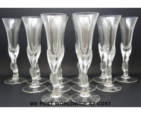 A complete set of 12 Carl Fabergé 'Kissing Doves' glasses, the body of fluted form supported by stems in the form of two fros