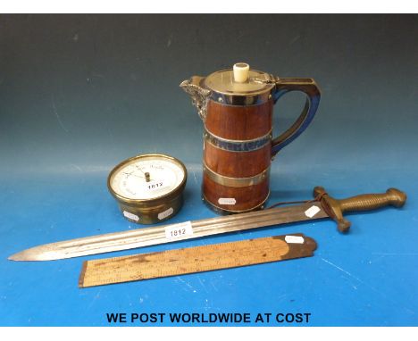A short sword, possibly WWI or earlier, brass barometer, Rabone ruler and a coopered and plated jug with mask spout