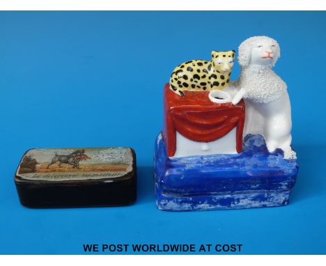 A papier maché transfer printed snuff box and a Staffordshire ink well with gilt anchor mark verso