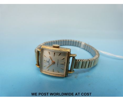 A Bucherer yellow metal ladies wristwatch with Swiss 17 jewel movement marked to the case 20 Plaque L on an expanding rolled 
