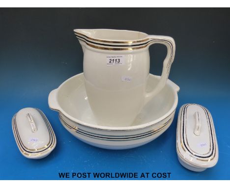 A French early 20thC jug and basin set, complete with soap dishes