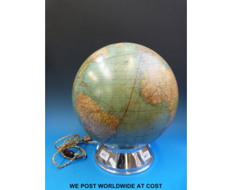 A vintage light up globe on a chrome base (height 38cm)