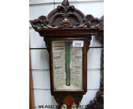 A 19thC carved oak stick barometer by Parkes & Son, Birmingham