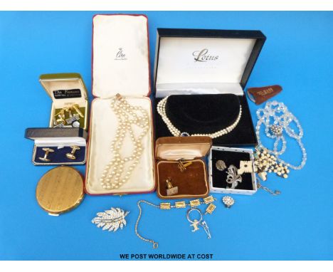 A collection of costume jewellery to include paste brooches, cufflinks, Stratton compact, lotus faux pearls etc 